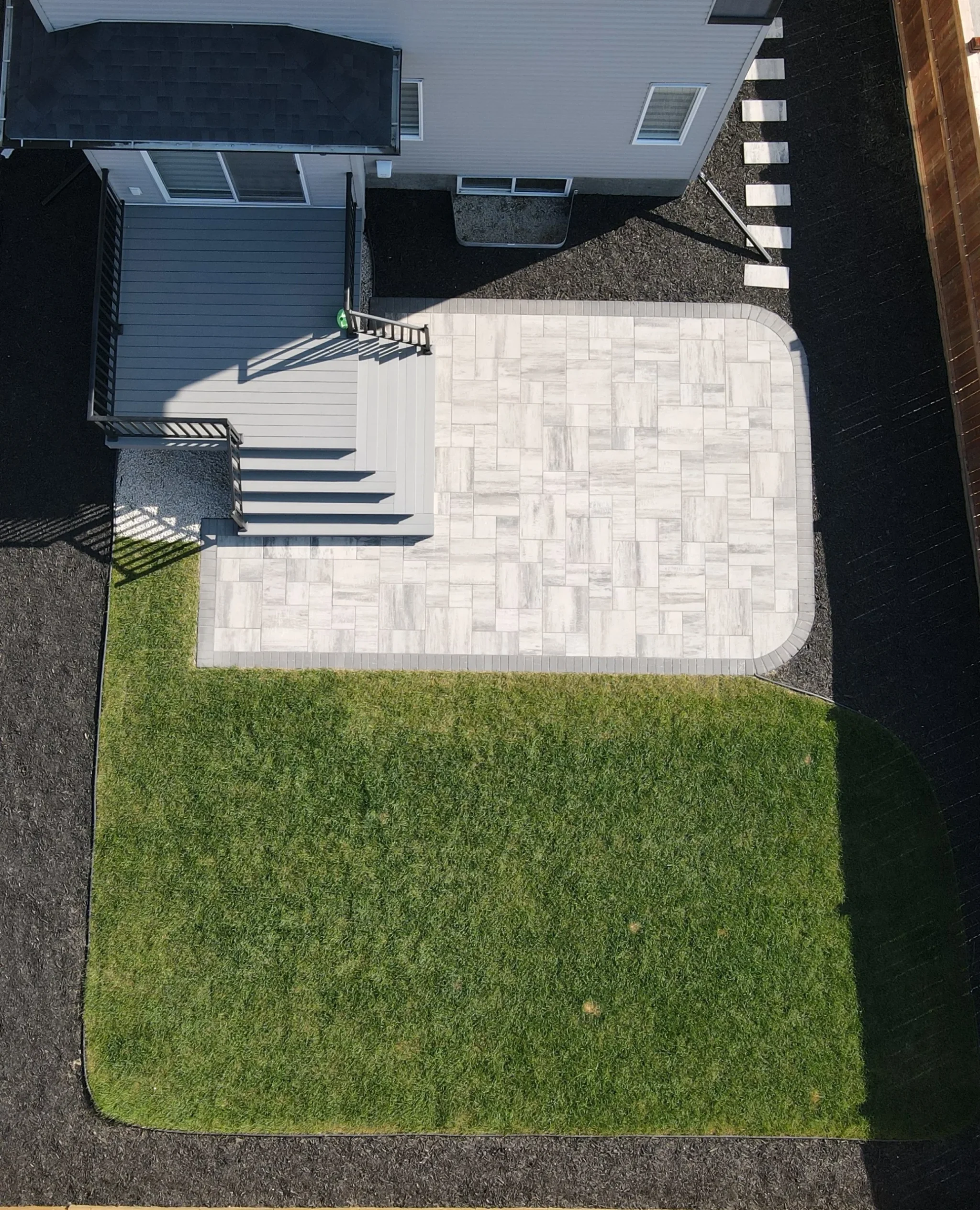 Skyview backyard patio, deck and sod installation