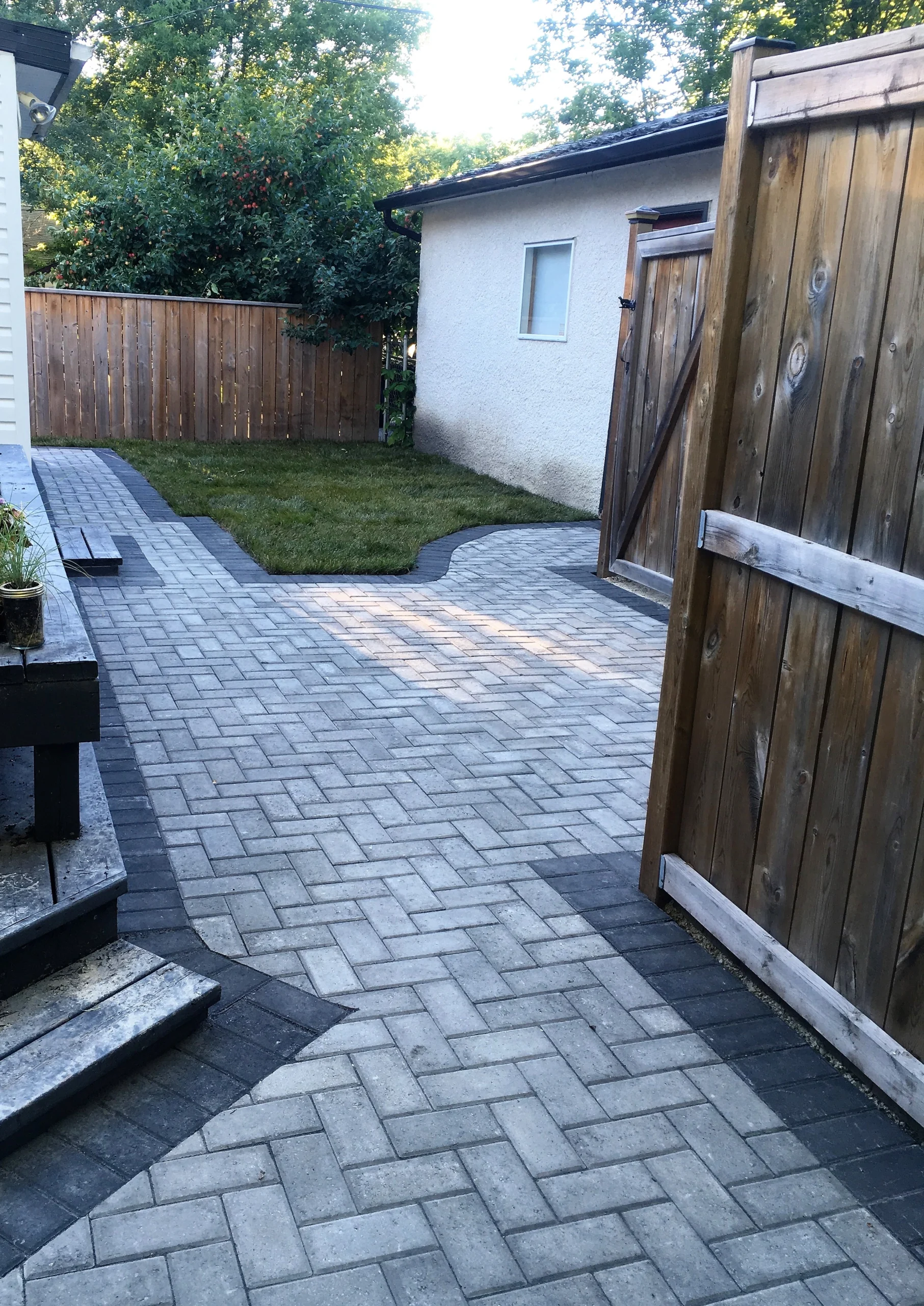 Holland paver patio - small backyard - Winnipeg landscaping