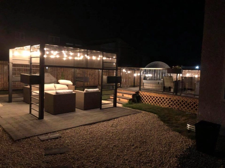 Night shot - Gazebo, pressure treated fence & composite deck installation 