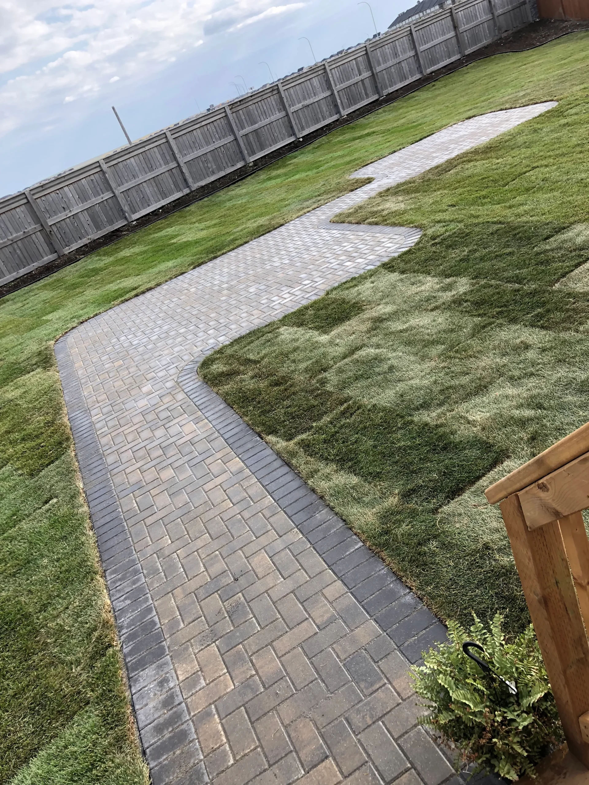 Holland paver patio and sidewalk installation - kentucy blue sod - landscaping winnipeg