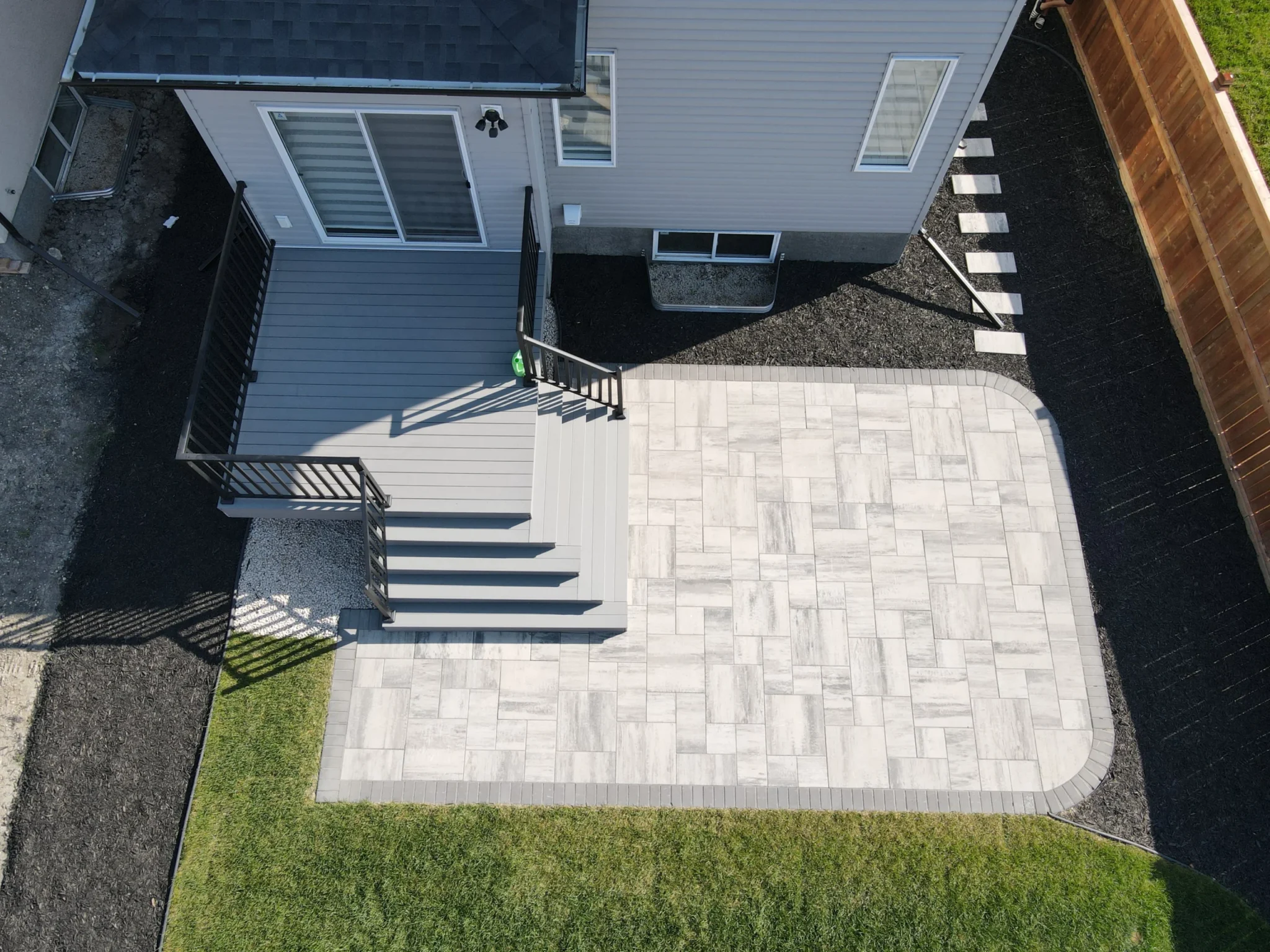 Backyard landscaping - Patio, deck, sod, mulch, fencing