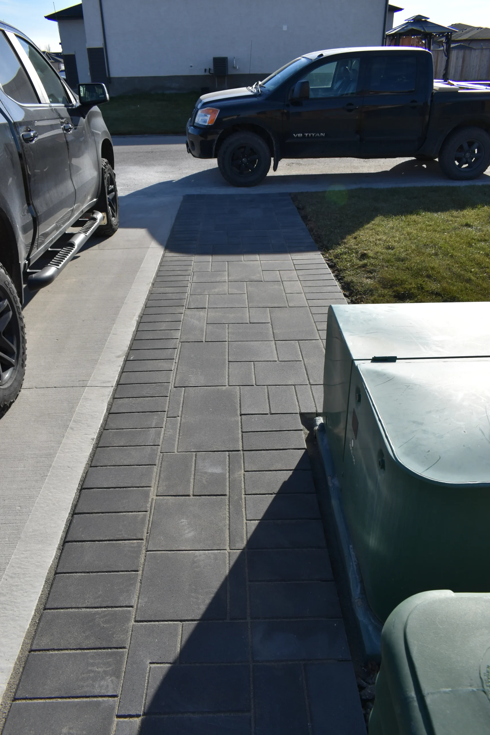 Barkman Broadway slab driveway extension installation - Driveways and Sidewalks Winnipeg 