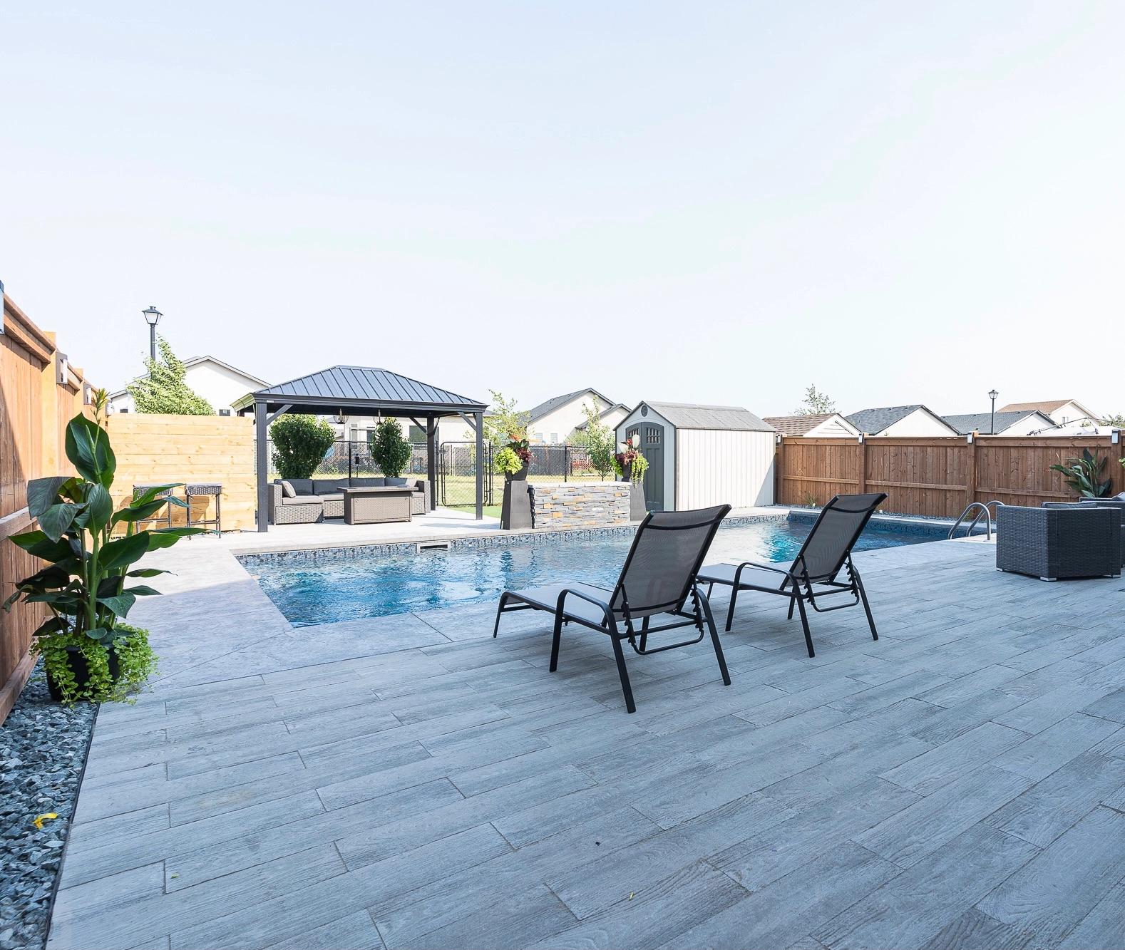 Winnipeg Landscaping - Pool deck installation - Barkman Arborwood Slabs - Landscaping Gallery Winnipeg