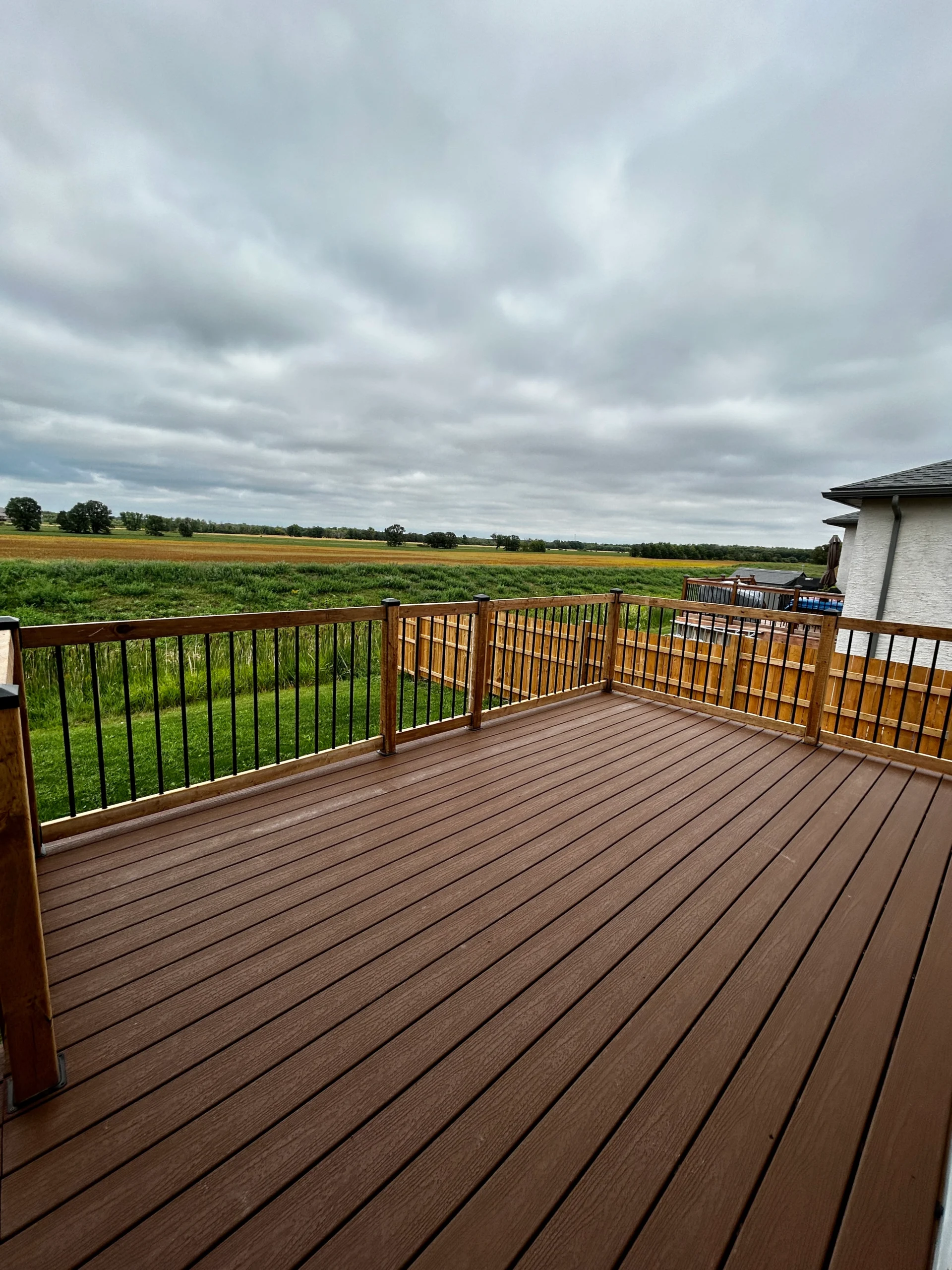Composite Decking & Pressure Treated Fence Installation - Winnipeg Manitoba Landscaping 