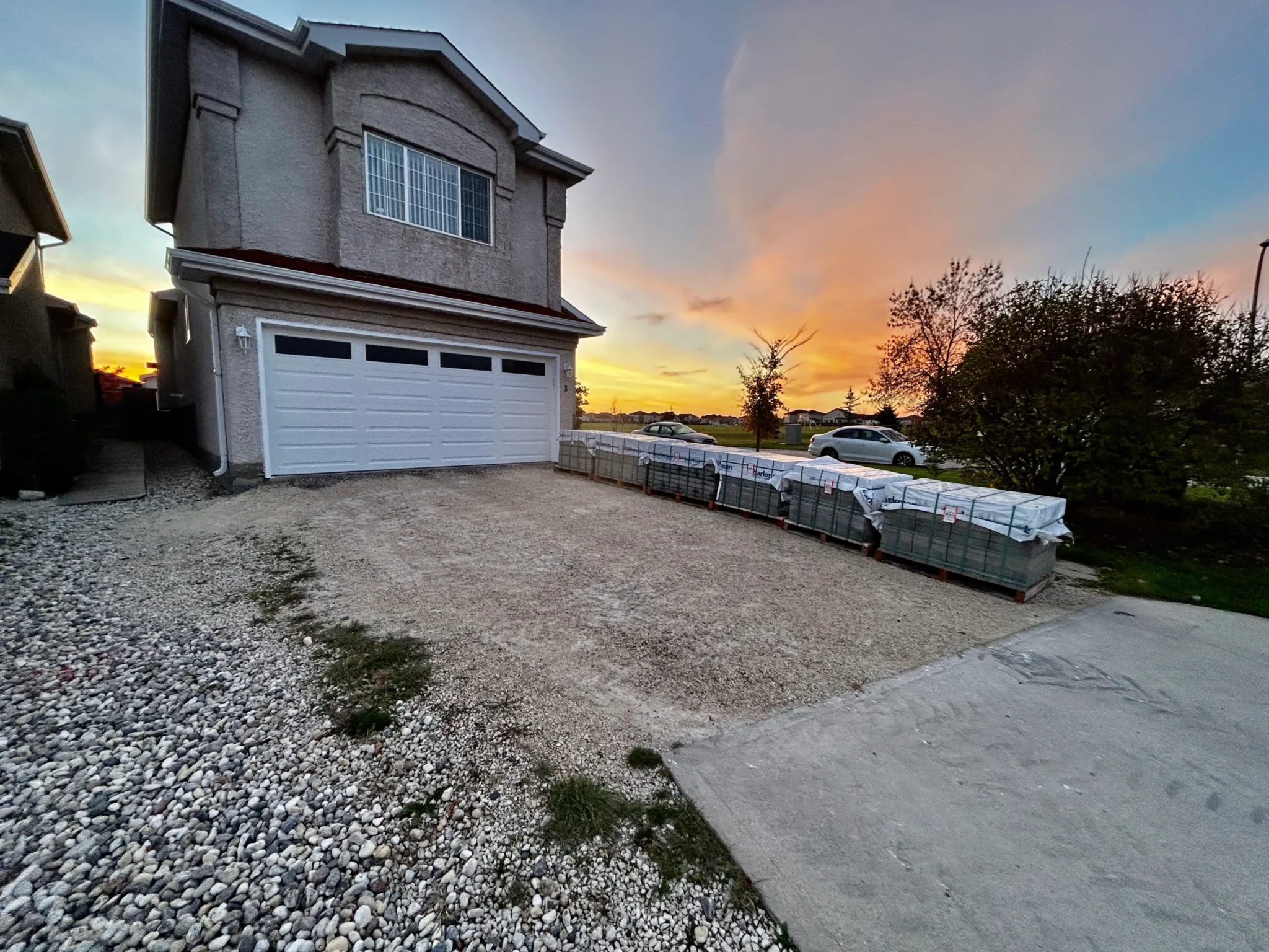 Interlocking driveway base installation by Genesis Interlocking in Winnipeg Manitoba