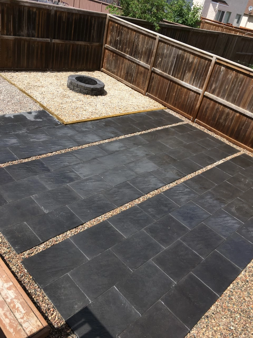 Custom backyard patio - multi space - Barkman slabs & fire pit - Interlocking Patios Winnipeg
