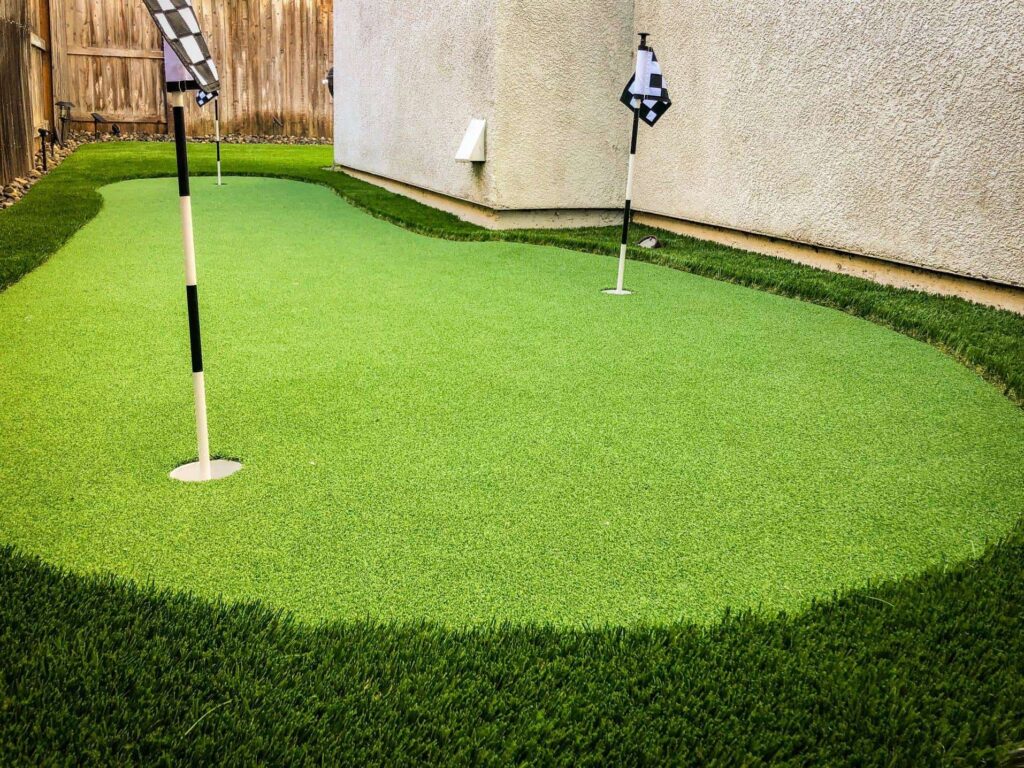 Artificial turf putting green installation