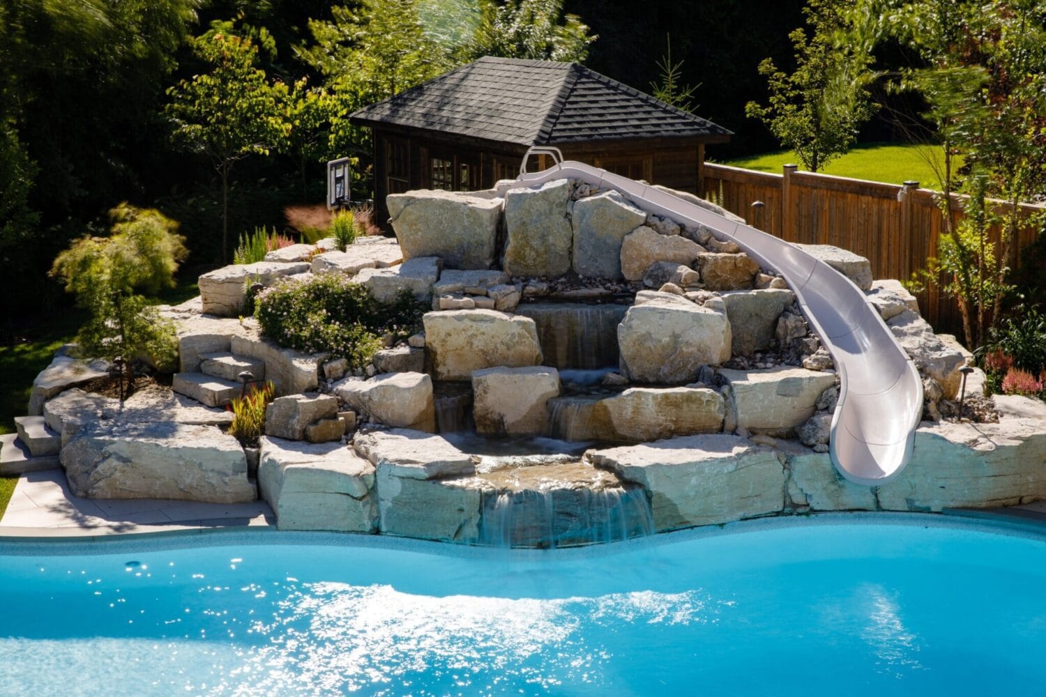 pool waterslide installation in a fiberglass pool Winnipeg Manitoba