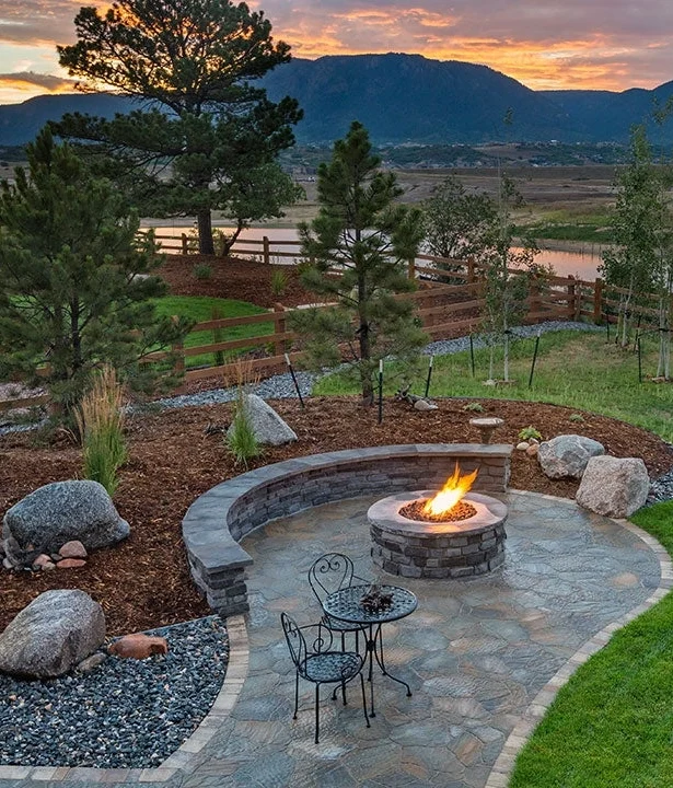Backyard landscaping upgrade - retaining wall seating wall with fire pit 