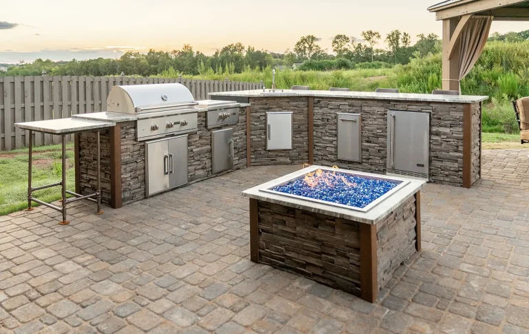 Gas fire pit with outdoor kitchen, BBQ and bar Landscaping