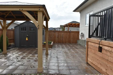 Pressure treated deck, Pergola and shed completed by Genesis Interlocking & Custom Landscaping