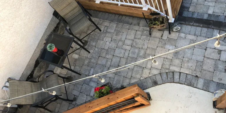 Above view of a Barkman roman paver patio with patio furniture