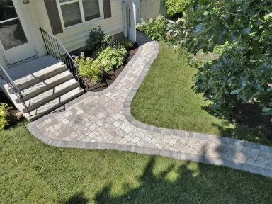 Barkman Roman paver front sidewalk completed by Genesis Interlocking & Custom Landscaping