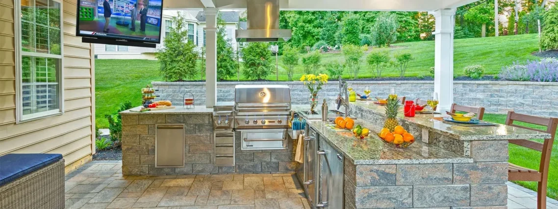 Backyard landscaping with full outdoor kitchen, BBQ and counter tops 